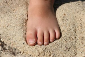 ein Fuß im Sand
